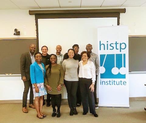 Current scholars in front of histp banner